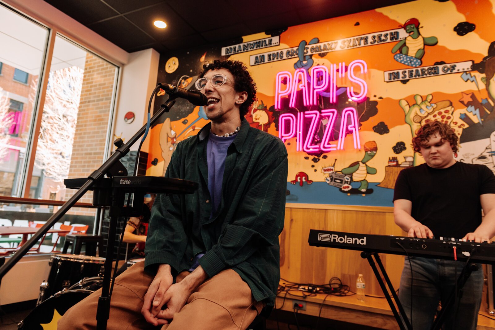 Maxwell Krueger "Max Wells" performs during the Creator Space 1 Year Bash.