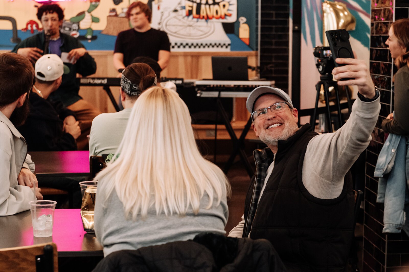 Jason Mann snaps a selfie during the Creator Space 1 Year Bash.