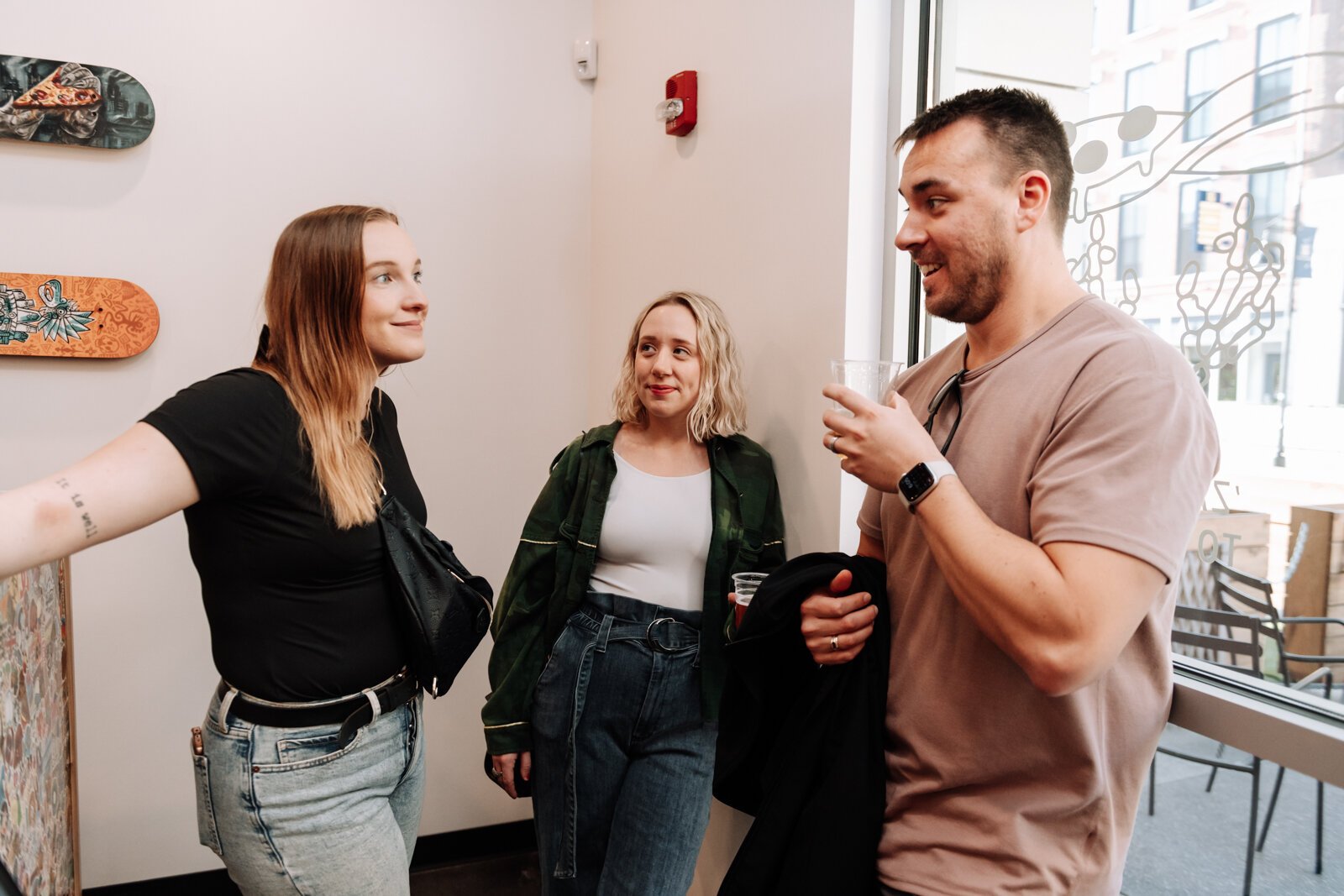 From left: Madie Vessels, Miranda Smith and Evan Mower connect during the Creator Space 1 Year Bash.