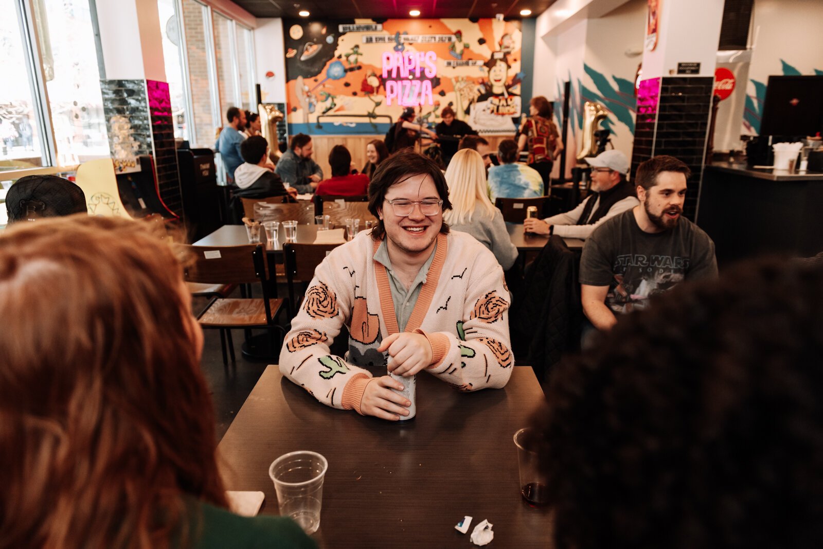 Harrison Beard networks during the Creator Space 1 Year Bash at Papi's Pizza.