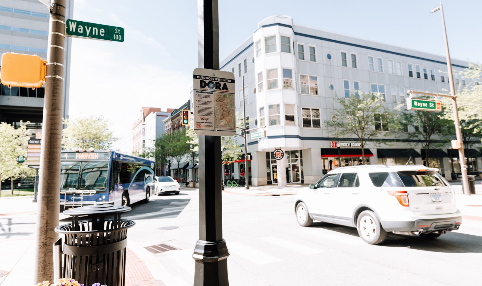 A sign at Wayne St. and Calhoun St. in downtown Fort Wayne reminds people of the rules within the new DORA (Designated Outdoor Refreshment Area).