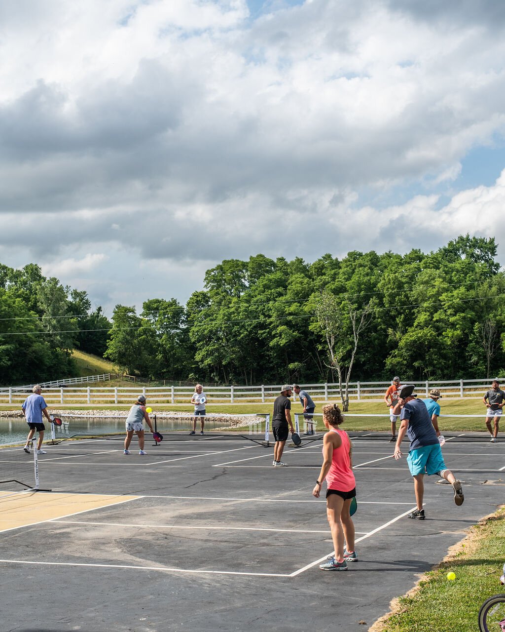 Friends gather to play at Hileman Farms, which features 5 private pickleball courts.