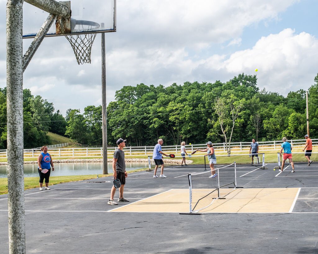 Friends gather to play at Hileman Farms, which features 5 private pickleball courts.