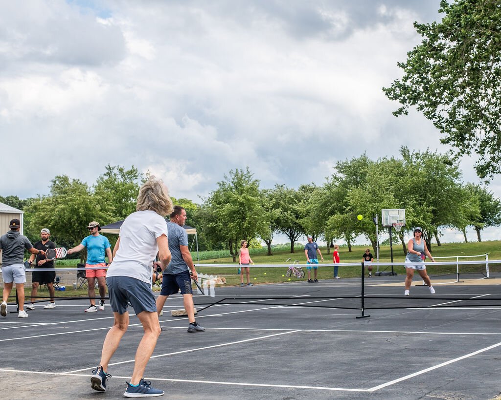 Friends gather to play at Hileman Farms, which features 5 private pickleball courts.