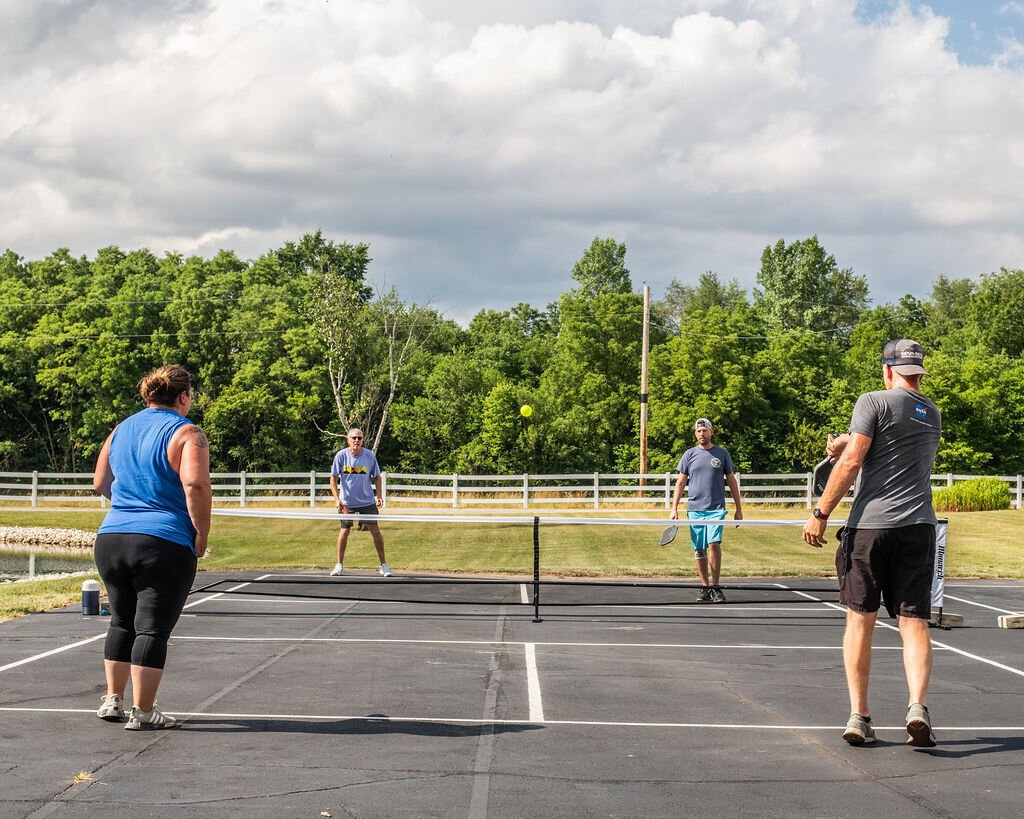 Friends gather to play at Hileman Farms, which features 5 private pickleball courts.
