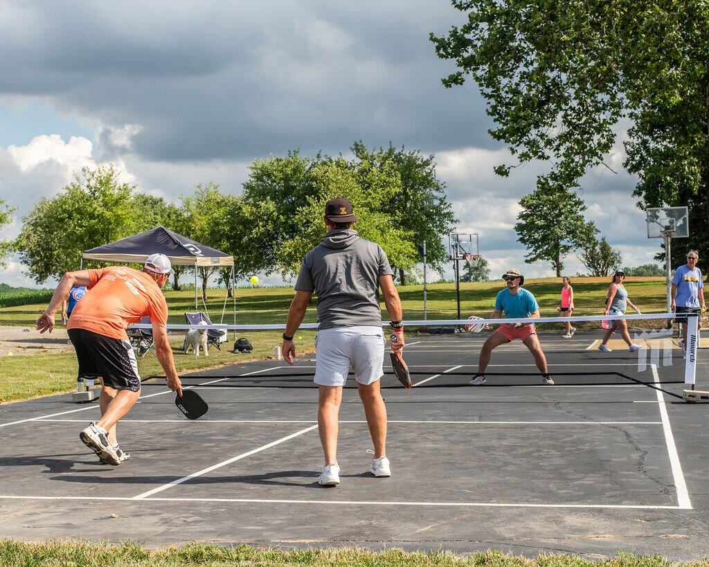 Friends gather to play at Hileman Farms, which features 5 private pickleball courts.