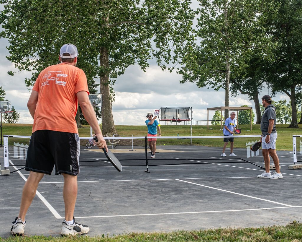 Friends gather to play at Hileman Farms, which features 5 private pickleball courts.