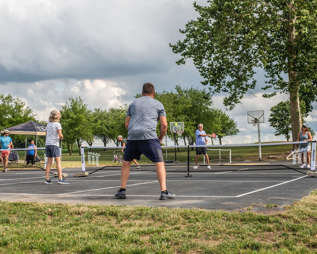 Friends gather to play at Hileman Farms, which features 5 private pickleball courts.
