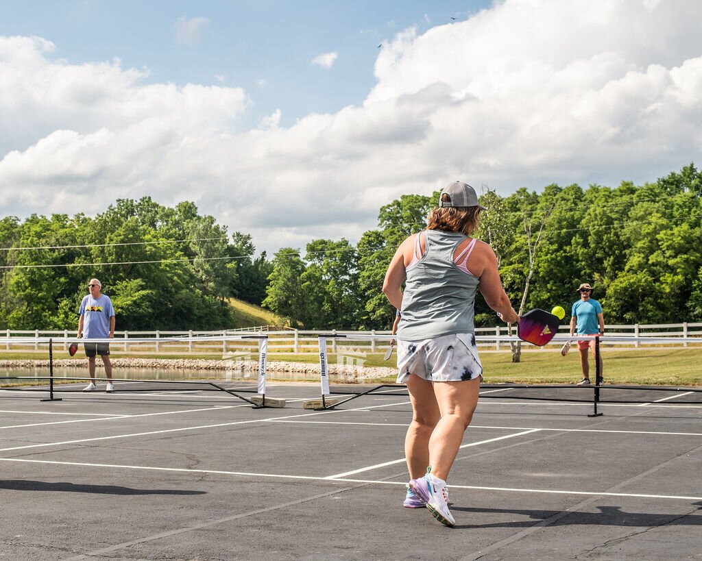 Friends gather to play at Hileman Farms, which features 5 private pickleball courts.
