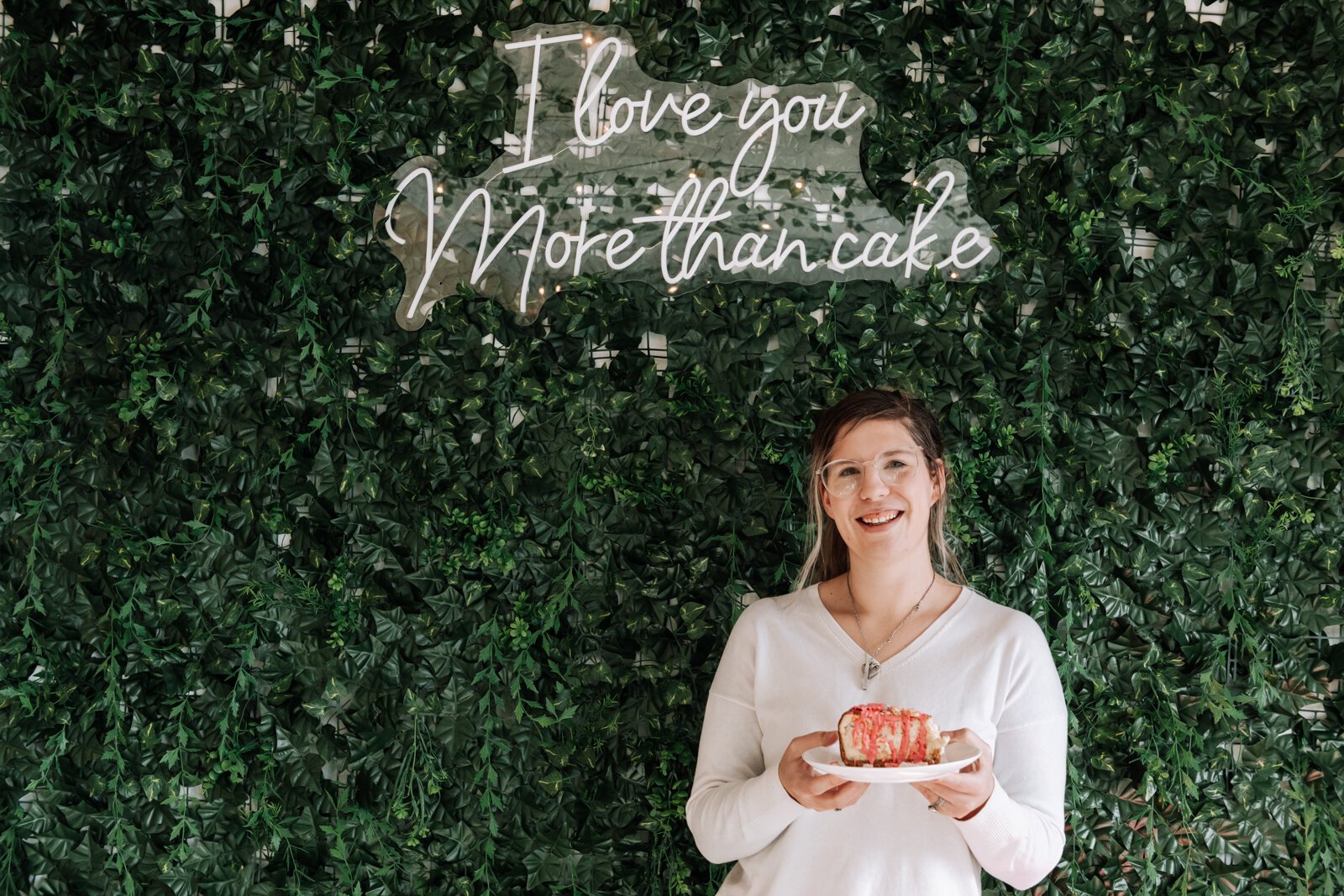 Owner and founder Grayce Holloway holds the frosted animal cookie cheesecake at Icing for Izaac, 243 Airport North Office Park, Fort Wayne, IN 46825.