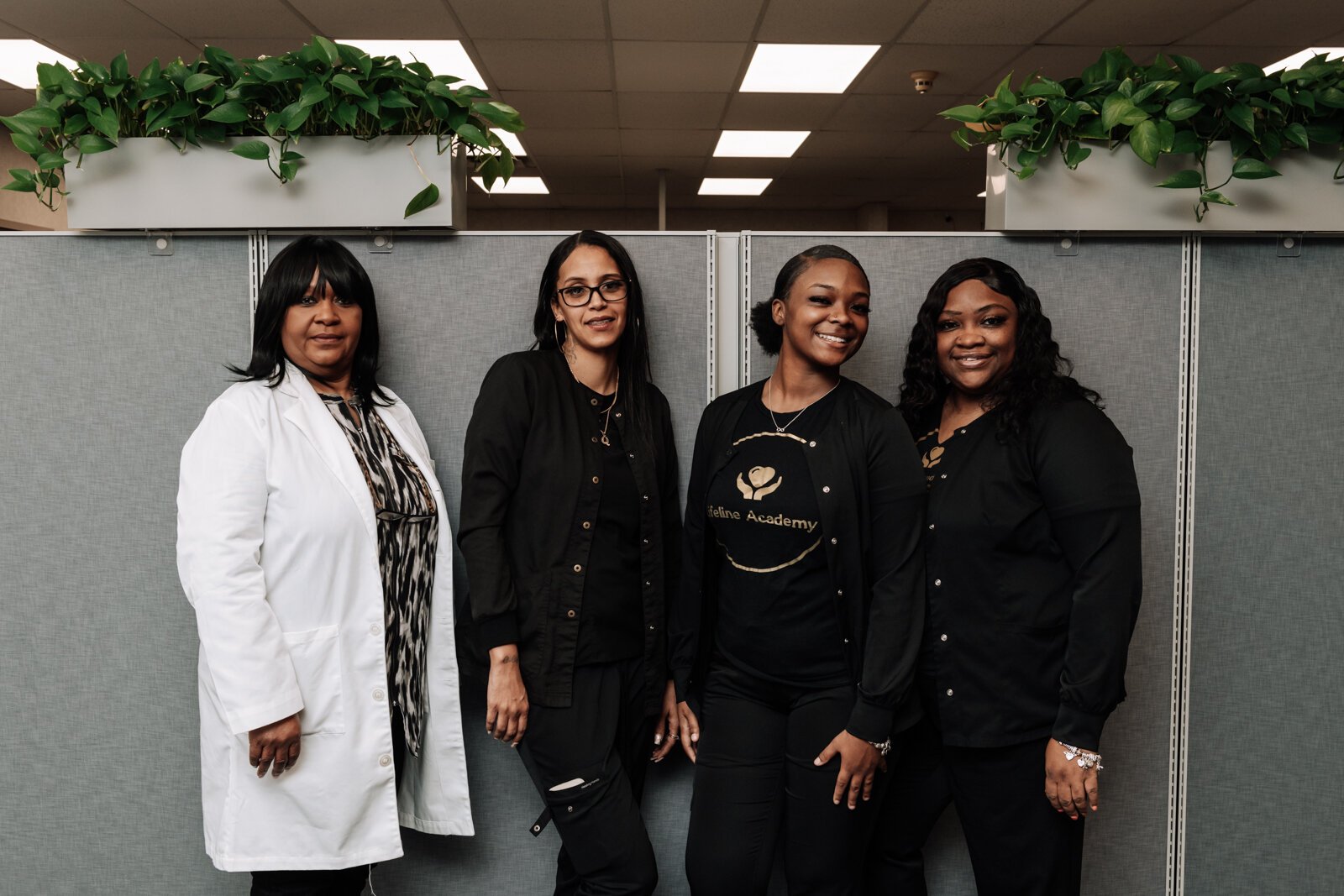 From left: Portrait of RN Instructor Queen Williams, student Mollie Niles, student Ja'Lona Franklin and SeAndra Robinson RN CEO at Lifeline Academy.