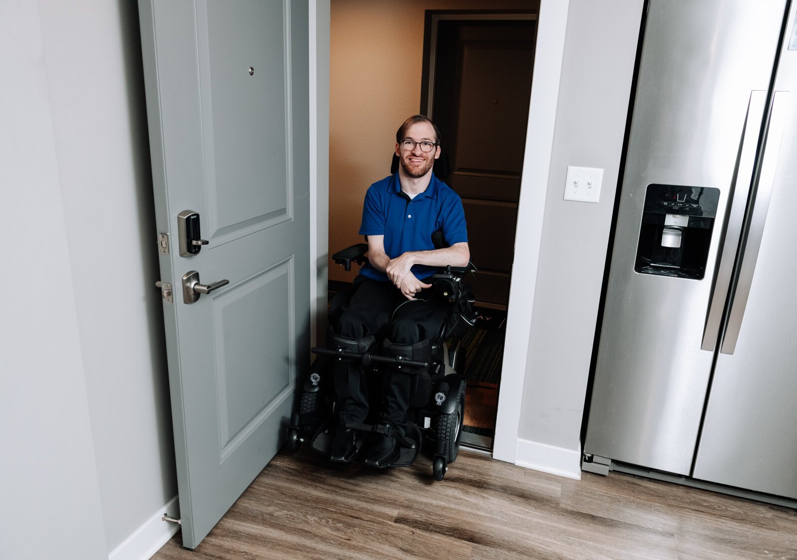 Luke Labas' front door is accessible in his apartment.