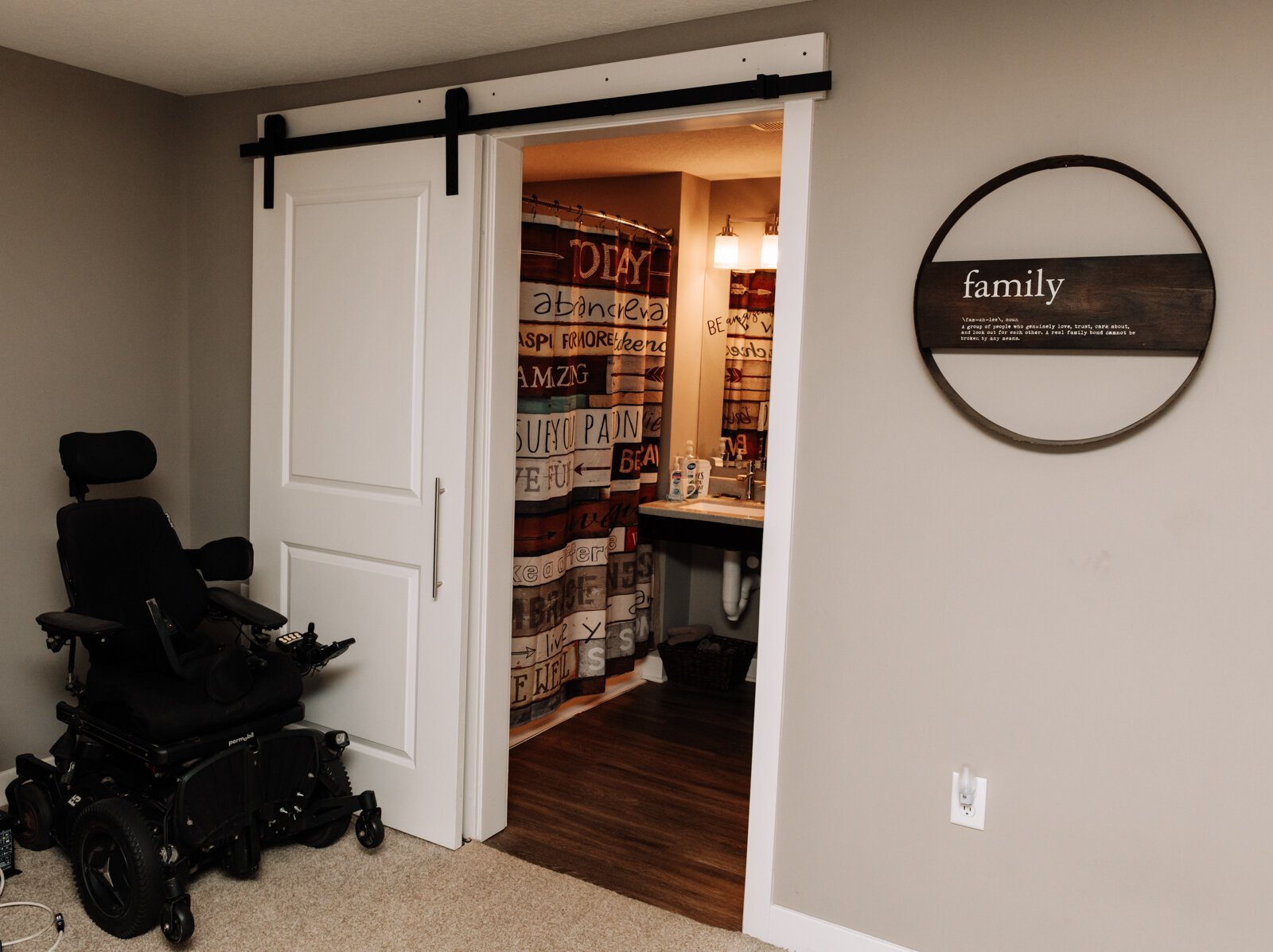 Luke Labas' bathroom features a sliding door.