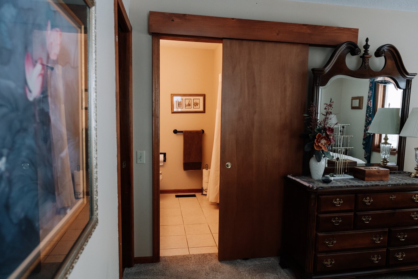 The master bathroom at Duchovic's home features a sliding door.