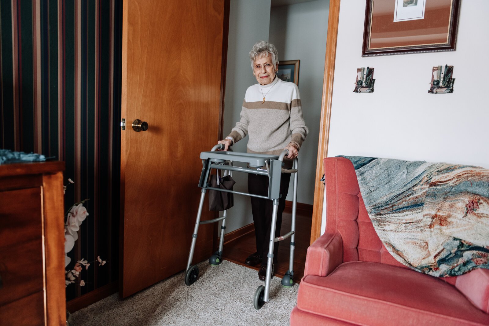 Duchovic's mother-in-law, Kay Miller, can fit through her bedroom doorway using a walker, but the entrance is too small to fit a wheelchair.