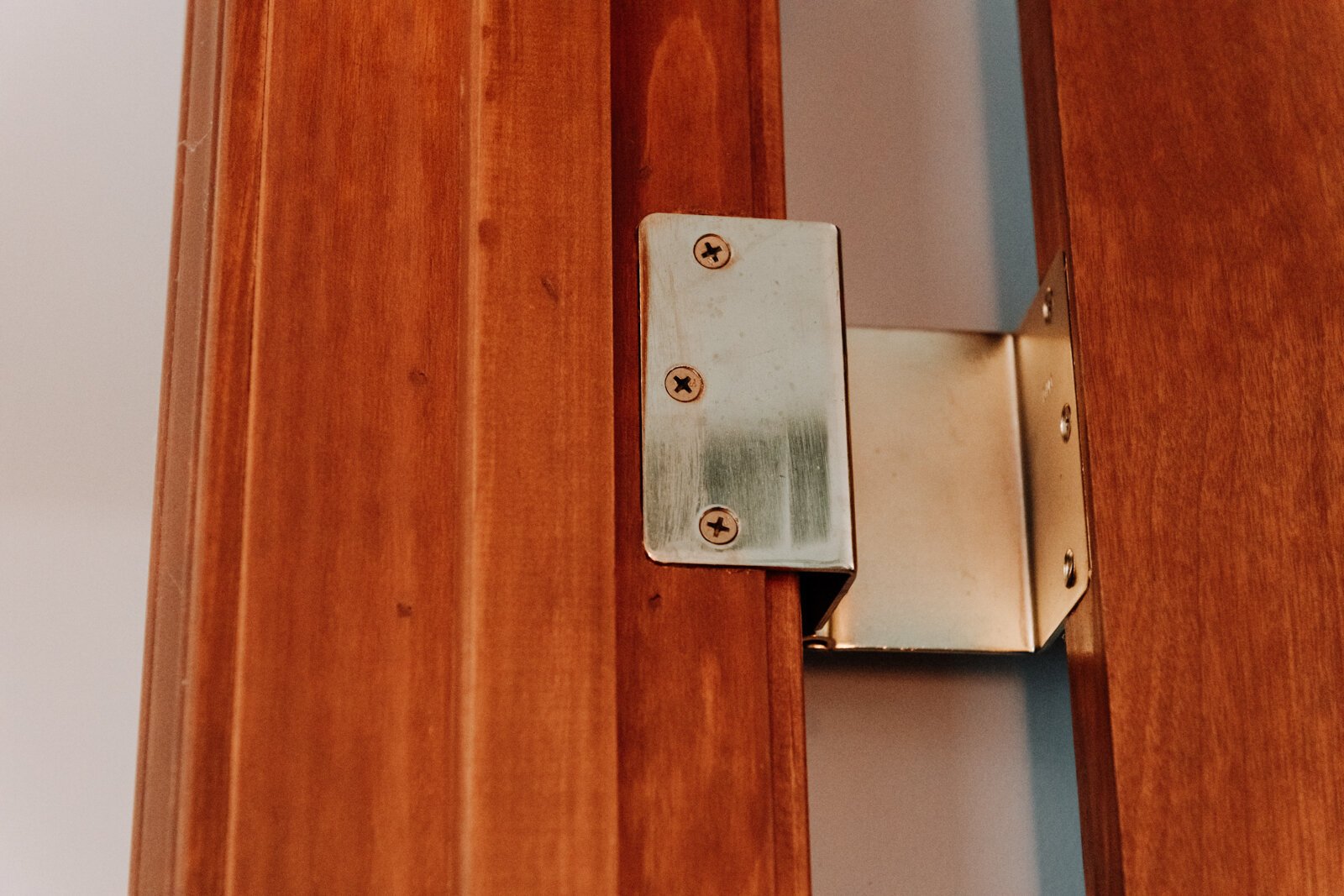 In Duchovic's home, this door uses an offset hinge, which creates more space for him to go through the door in his wheelchair.