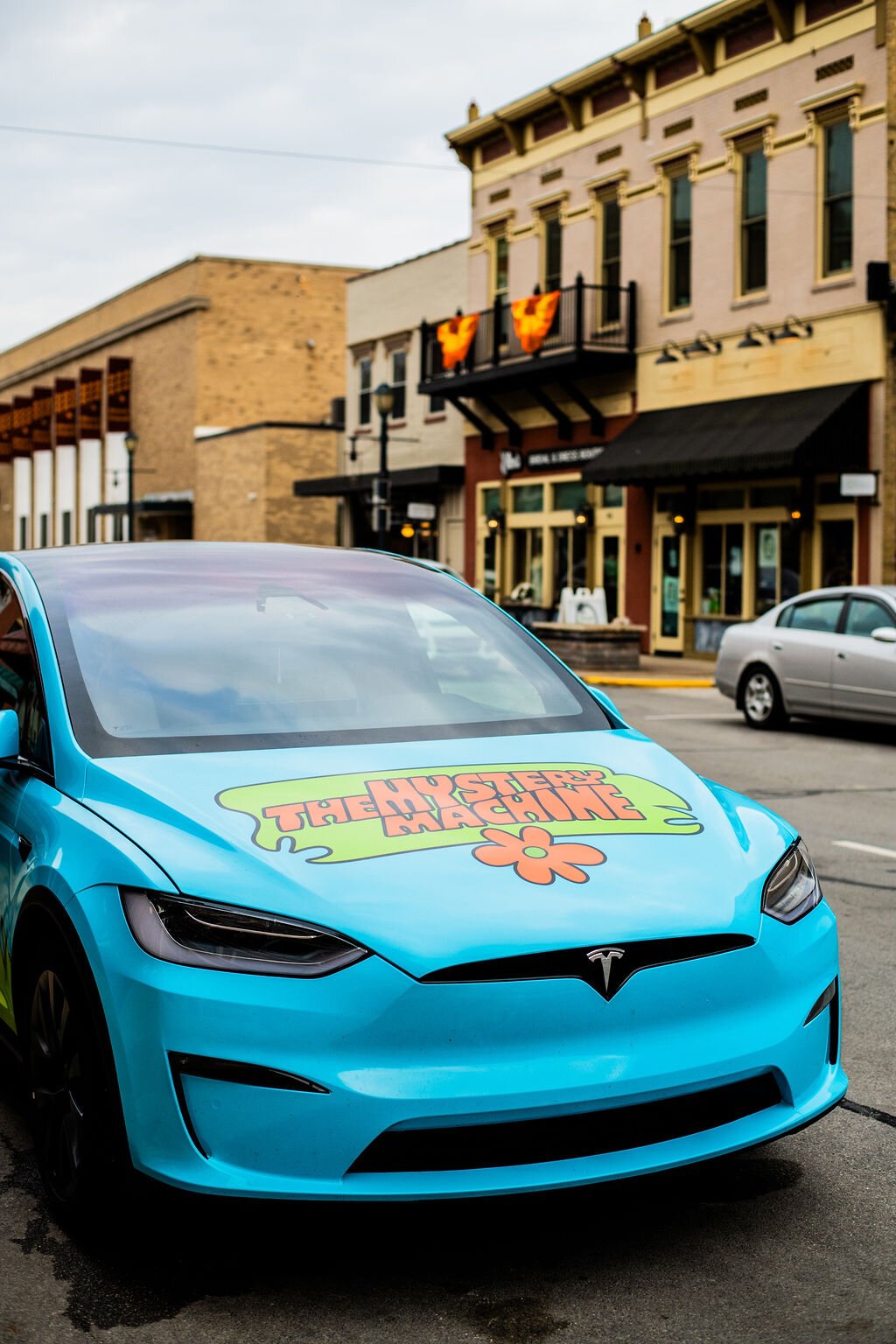 Shane Waters' Tesla, made to look like the Mystery Machine from "Scooby Doo."