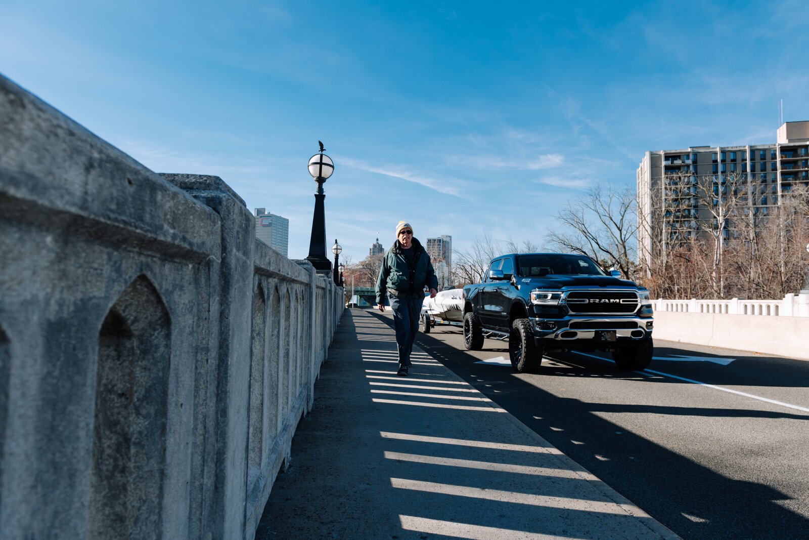 Mike Roeger walks the bridge on Saint Joe Boulevard near Conjure Coffee in Fort Wayne.