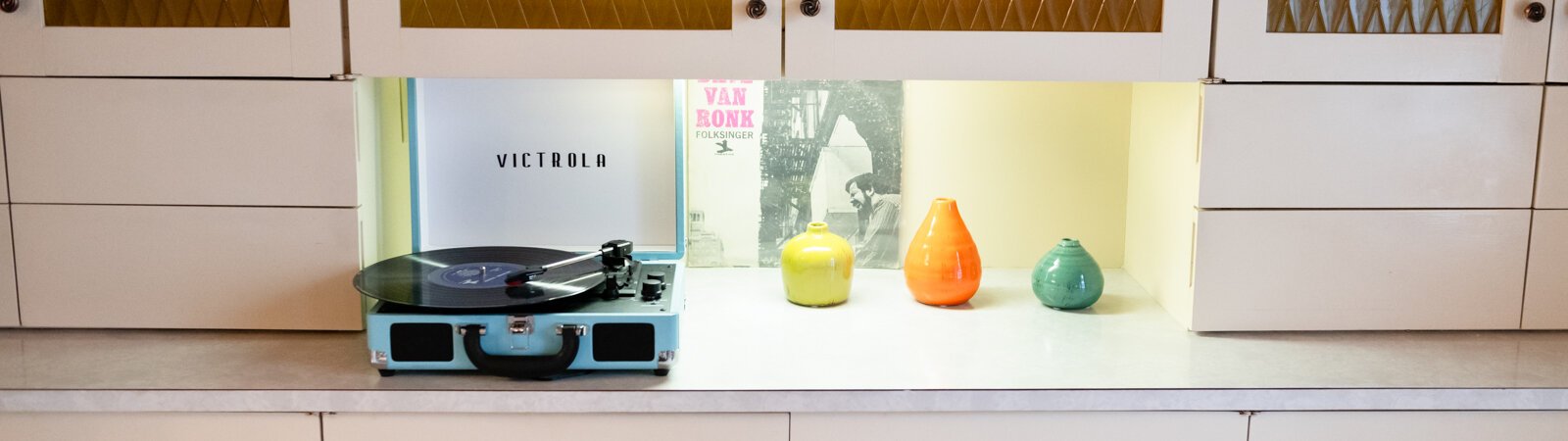 Plenty of storage along with a record player as the living room leads into the kitchen at the Airbnb recreation of Fawn Liebowitz's childhood home from the movie "Animal House." 