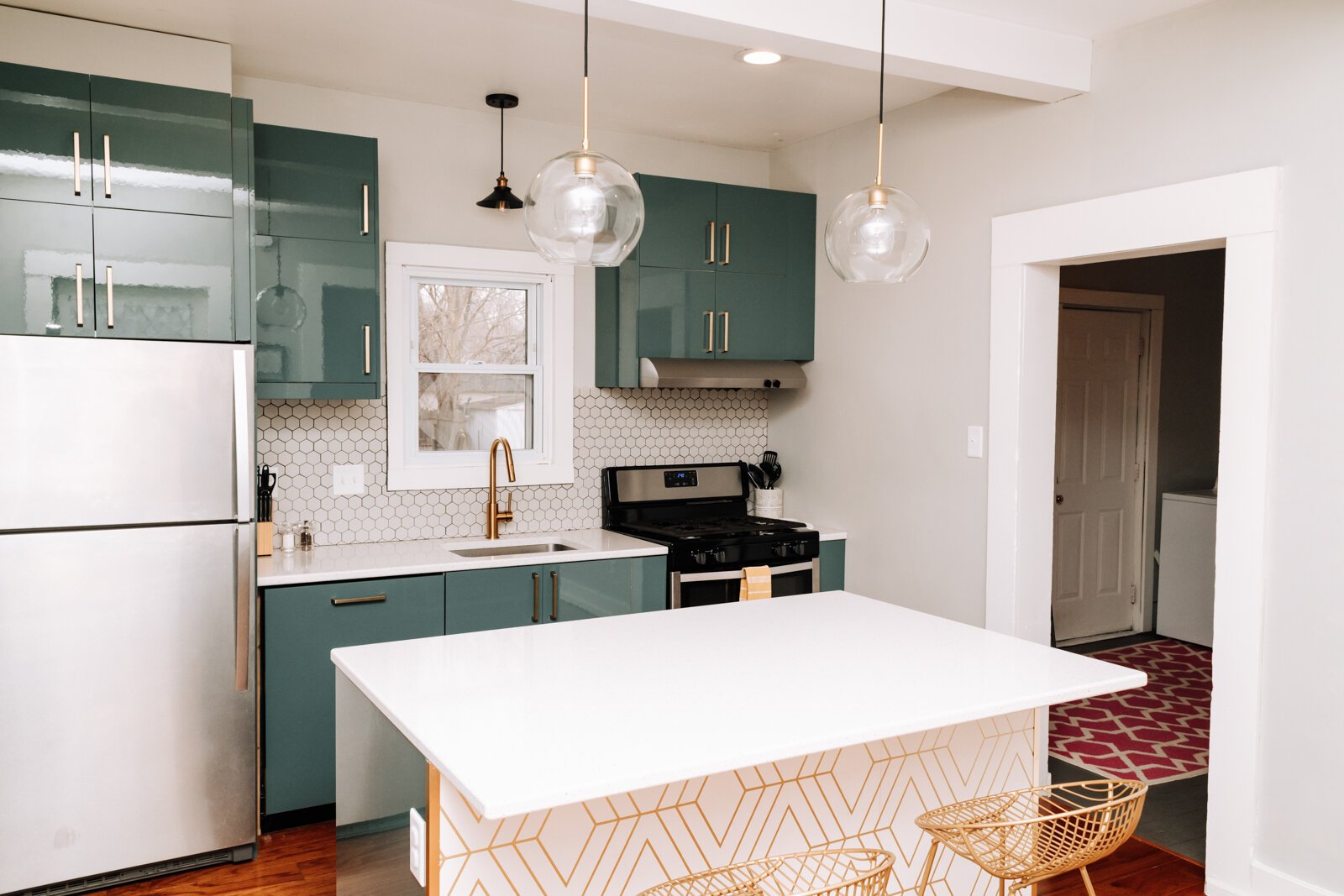 The Airbnb's kitchen is bright and features an island.