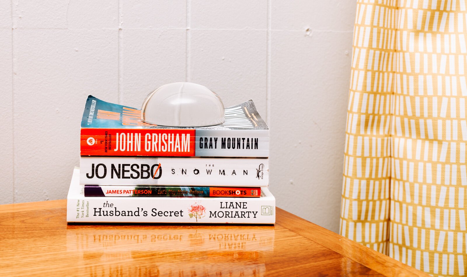 Books decorate one of the guest bedrooms at the Airbnb owned by Kelly and Ryan Benton.