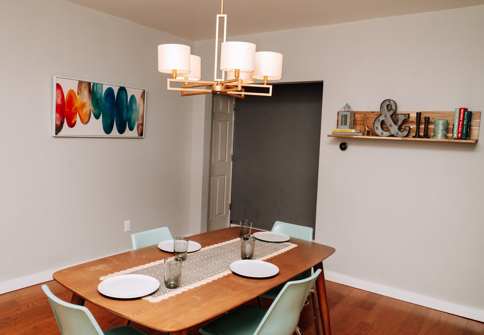 Kelley and Ryan's dining room features a big wood table.