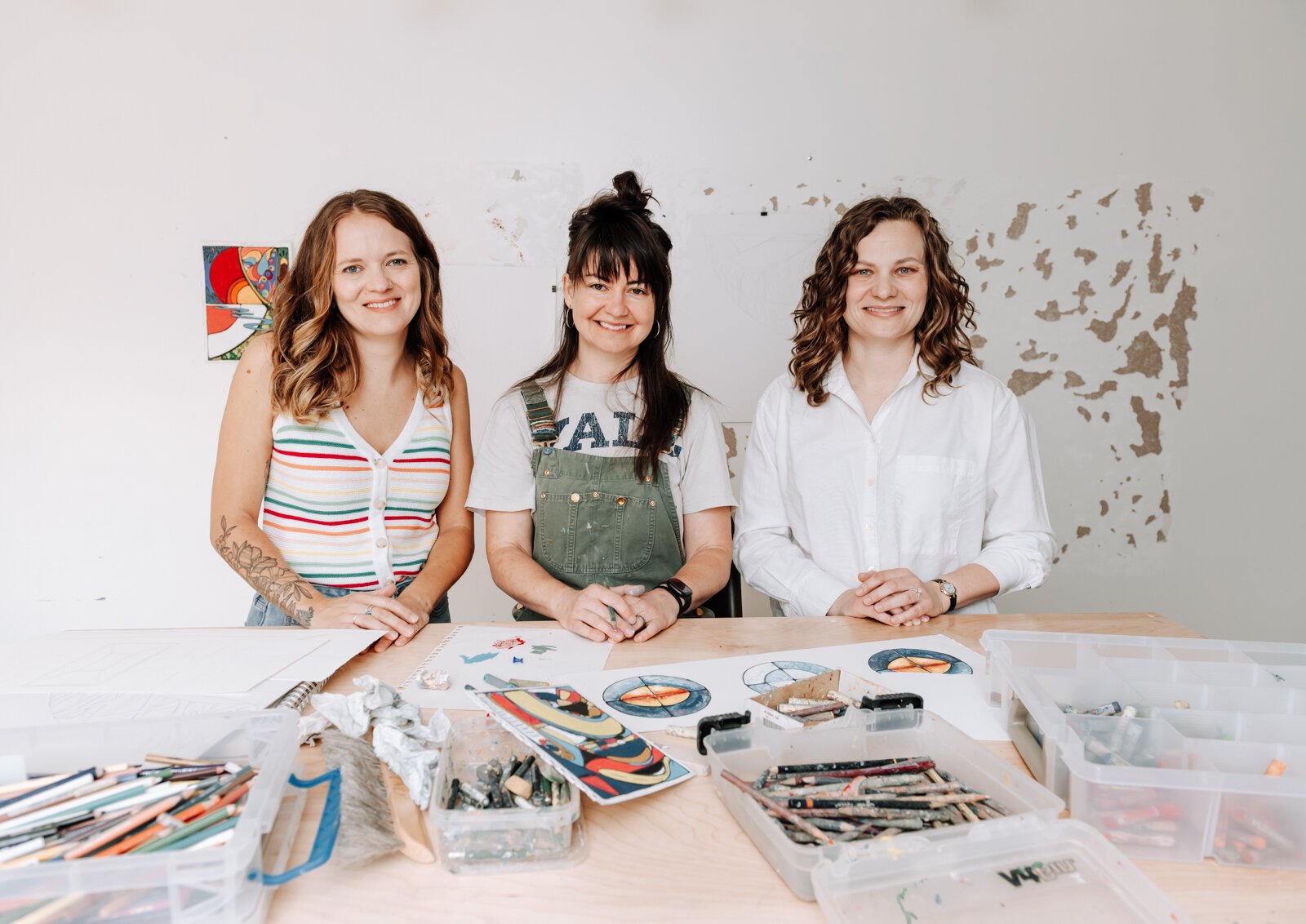 From left: Residency Founder & Co-Director of Kinhouse Gallery & Residency Kaylan Buteyn works with Sarah Wolfe, artist in residence, along with Dana Caldera, Co-Director of Kinhouse Gallery.