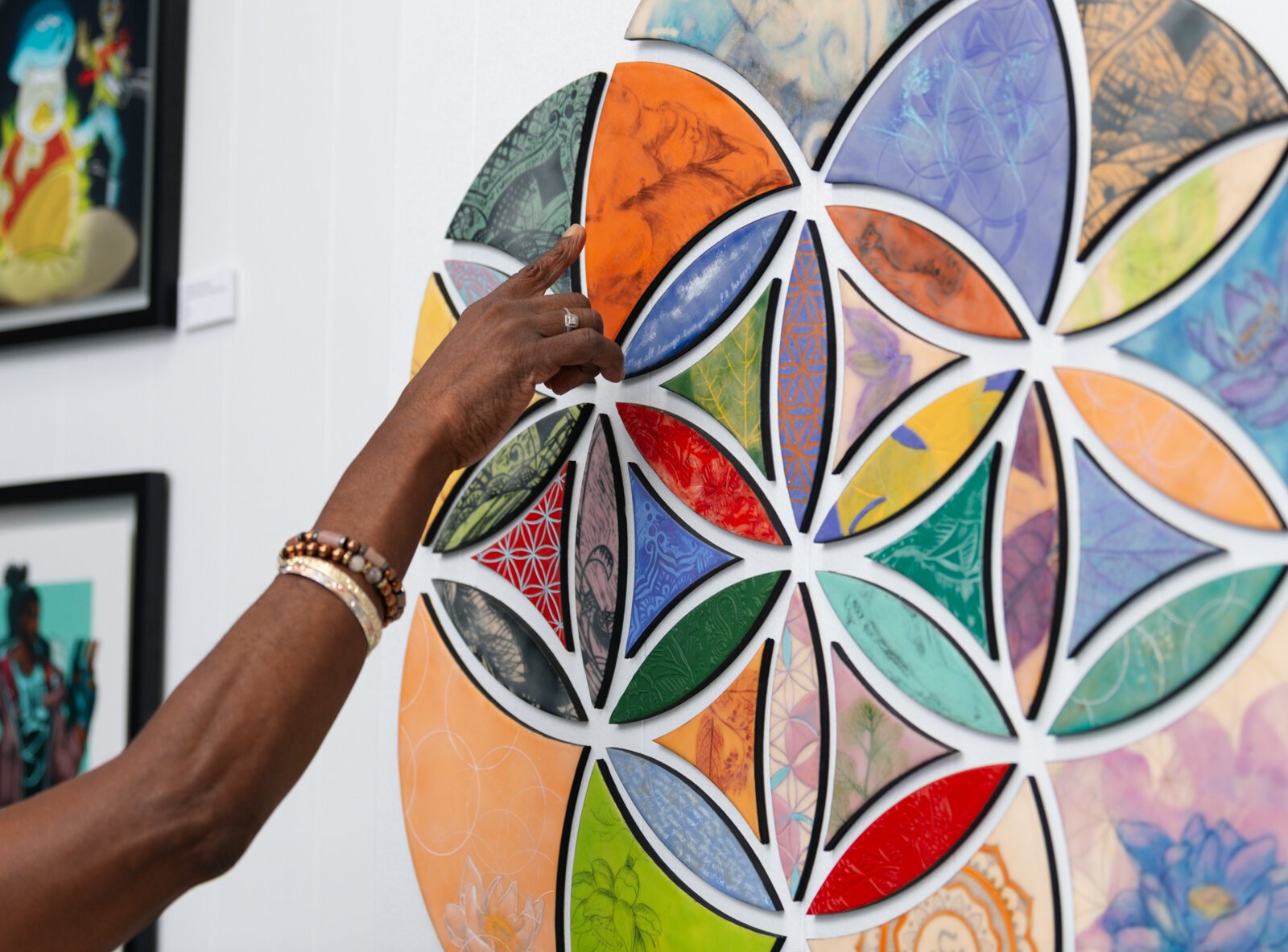 Clydia Early, owner of the BIPOCA Incubator and Gallery, talks about the "Encaustic Panel" by Nancy Fritz.
