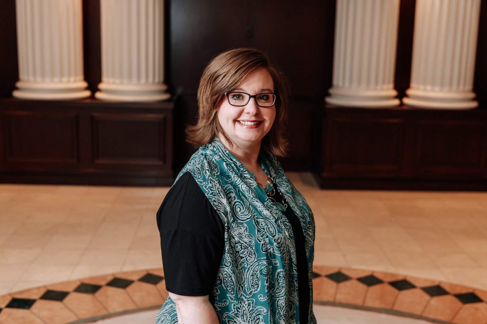 Portrait of Emily Almodovar, Public Information Officer at Allen County at Citizens Square.