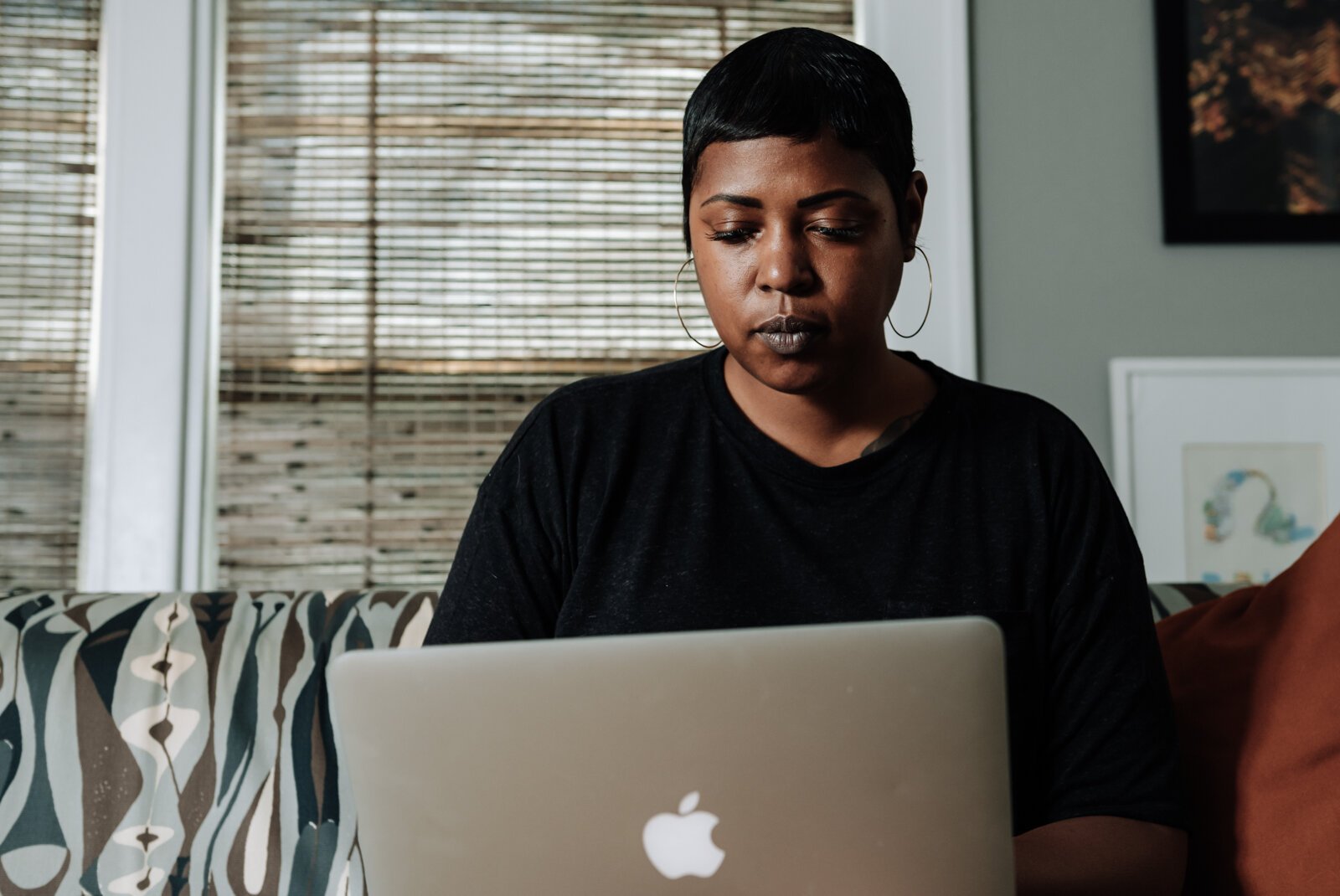 Creative Writer Shanel Turner works on writing in one of her favorite workspaces in the living room at her home in the '07.