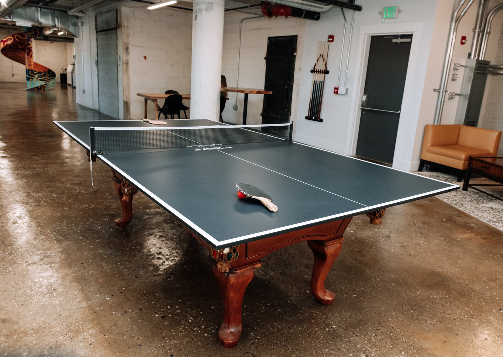 The communal pool table at Paper Mill Workspace on the 4th floor above Utopian Coffee.