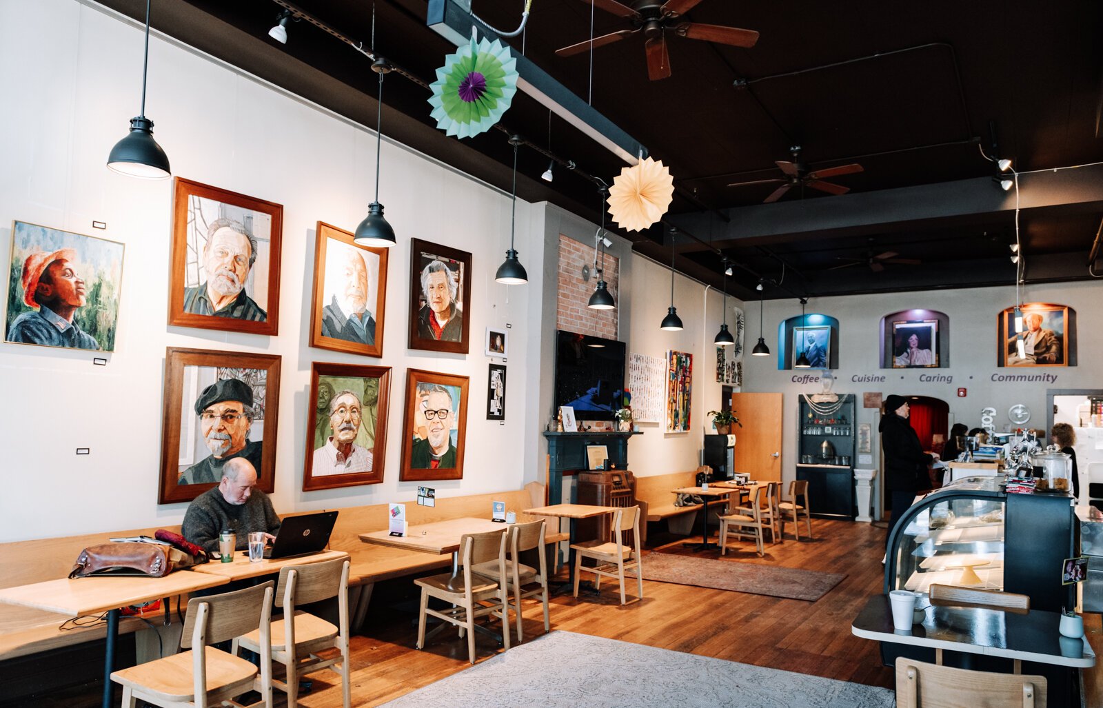 Davey's Delicious Bagels features many tables and natural light in their main room.