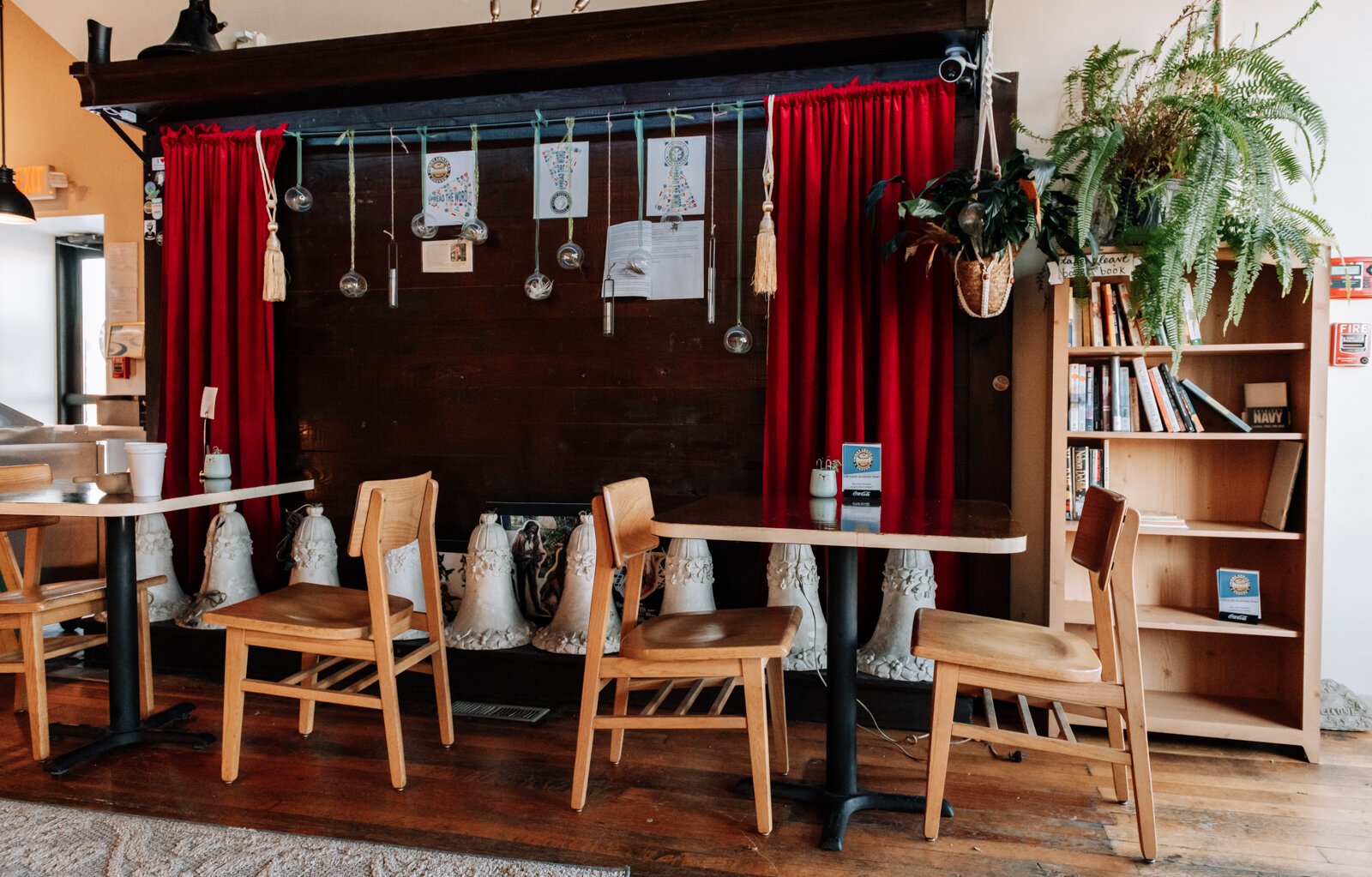 Davey's Delicious Bagels features many tables and natural light in their main room.