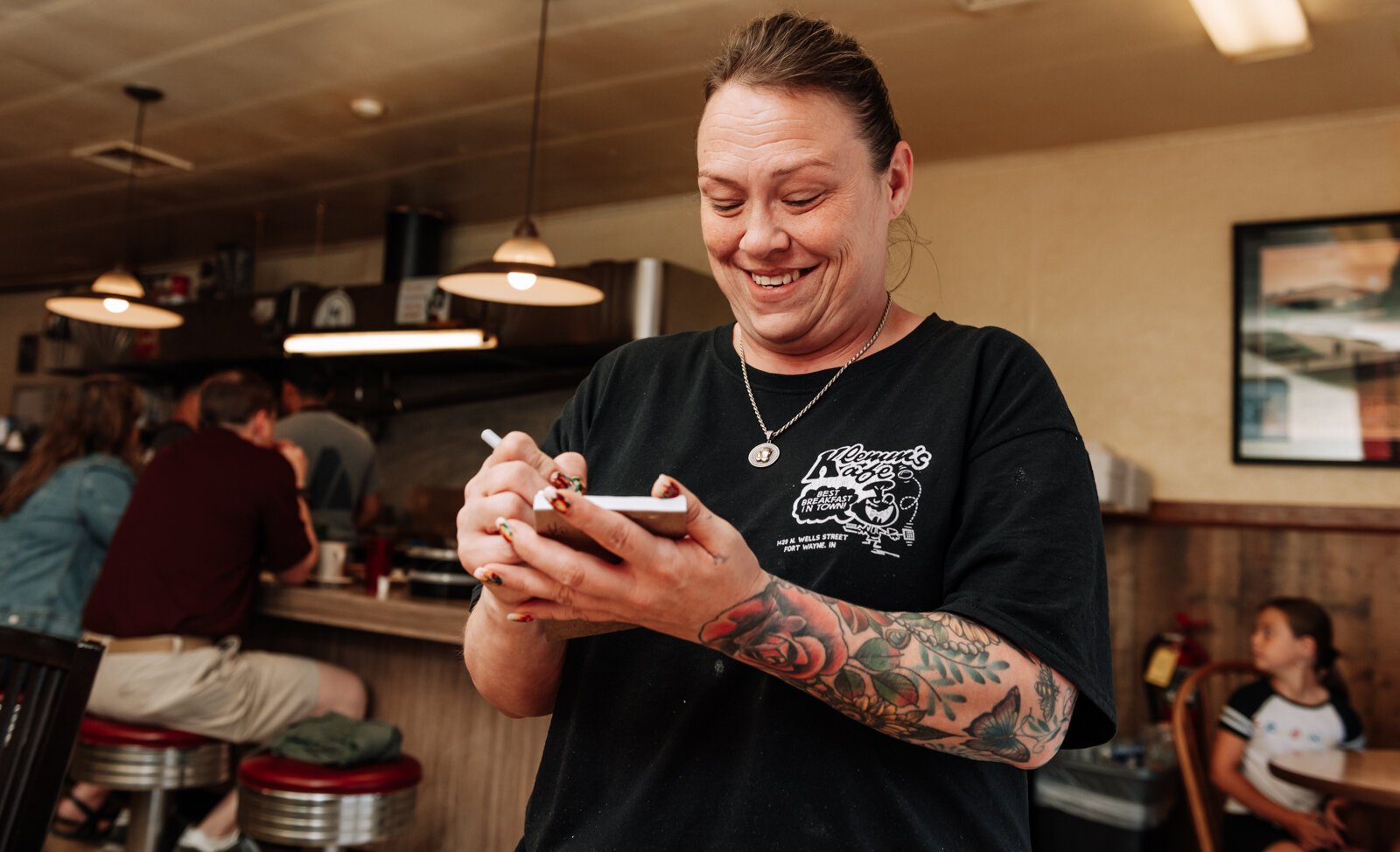 Server Teresa Rivers takes an order at Klemm's Kafe, 1429 N. Wells St.