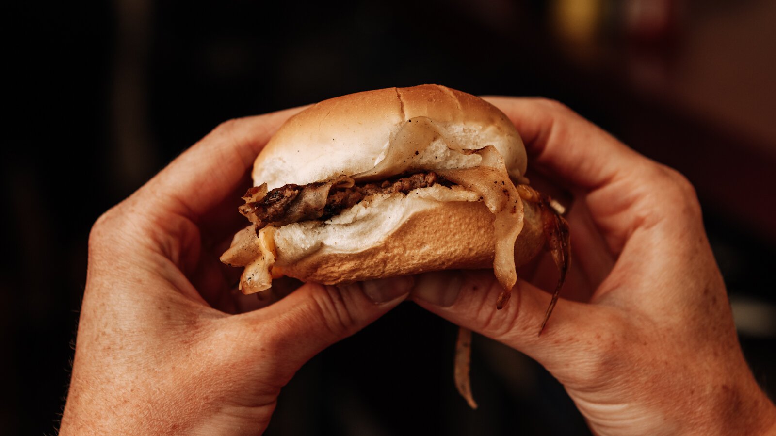 The Powers slider with onions and cheese at Powers Hamburger Restaurant, 1402 S. Harrison.