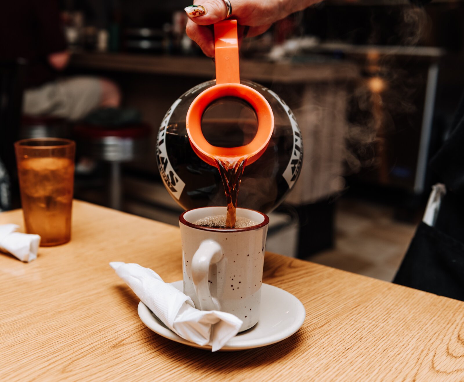 Server Teresa Rivers pours coffee at Klemm's Kafe, 1429 N. Wells St.