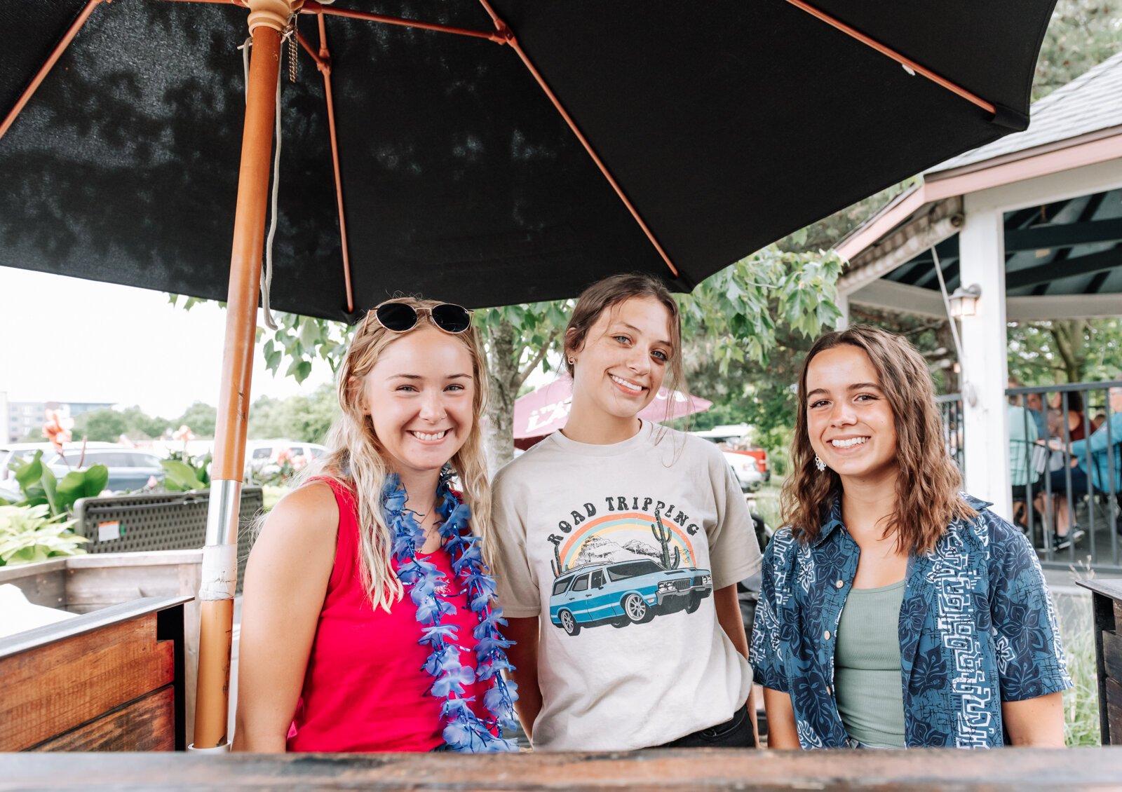 From left: Hostesses' Tia Gensic, Grace Runyon, and Abigail Hall at The Deck, 305 E. Superior.
