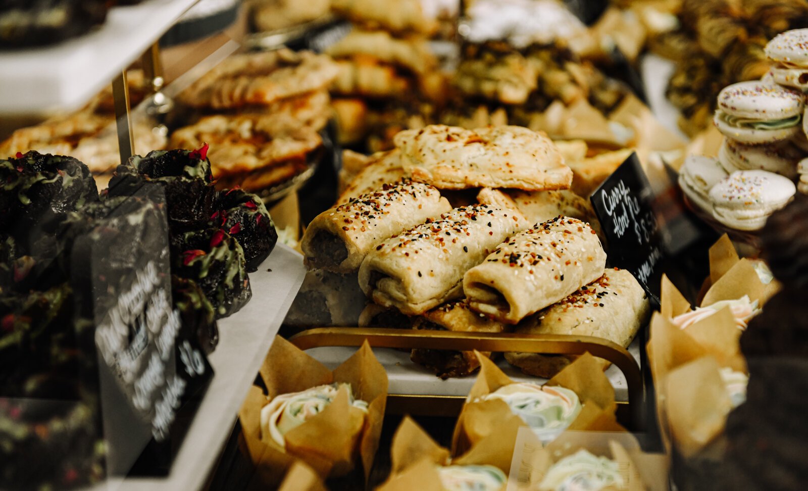 A variety of baked goods in the case during the grand opening of Good Bread for All.