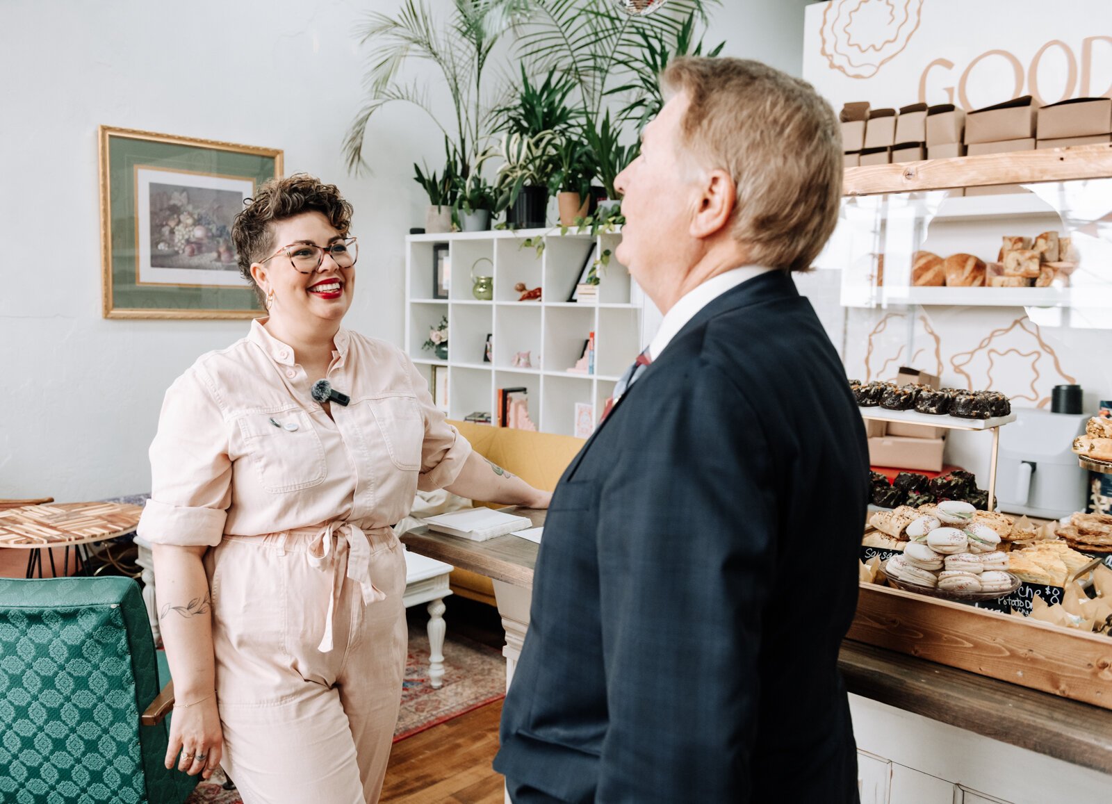 Owner Sarah Thompson, left, speaks with city Councilman Geoff Paddock, who came out to show his support during the grand opening of Good Bread for All.