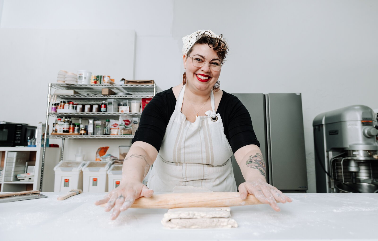 Sarah Thompson works on laminating croissant dough.