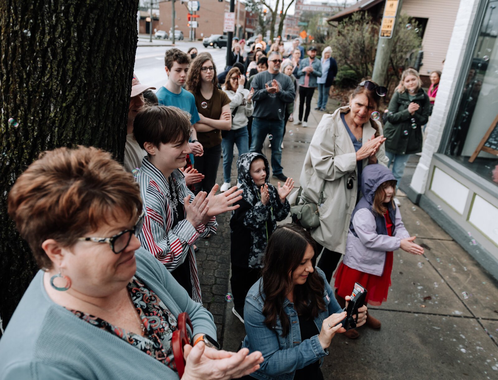 Customers line up down the block during the grand opening of Good Bread for All.