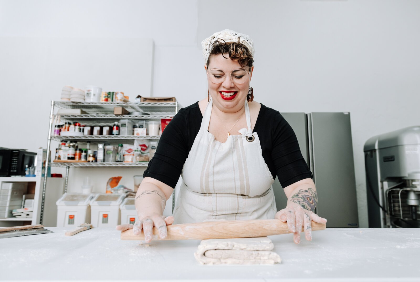 Sarah Thompson works on laminating croissant dough.