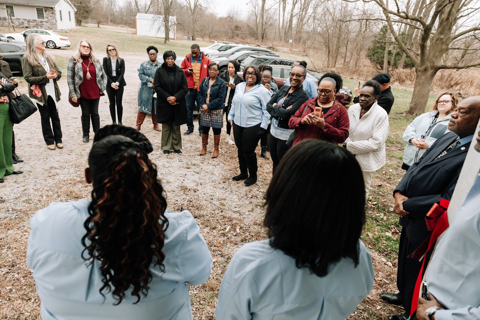 Guests witness the ribbon cutting of Hands on Haven Inc.