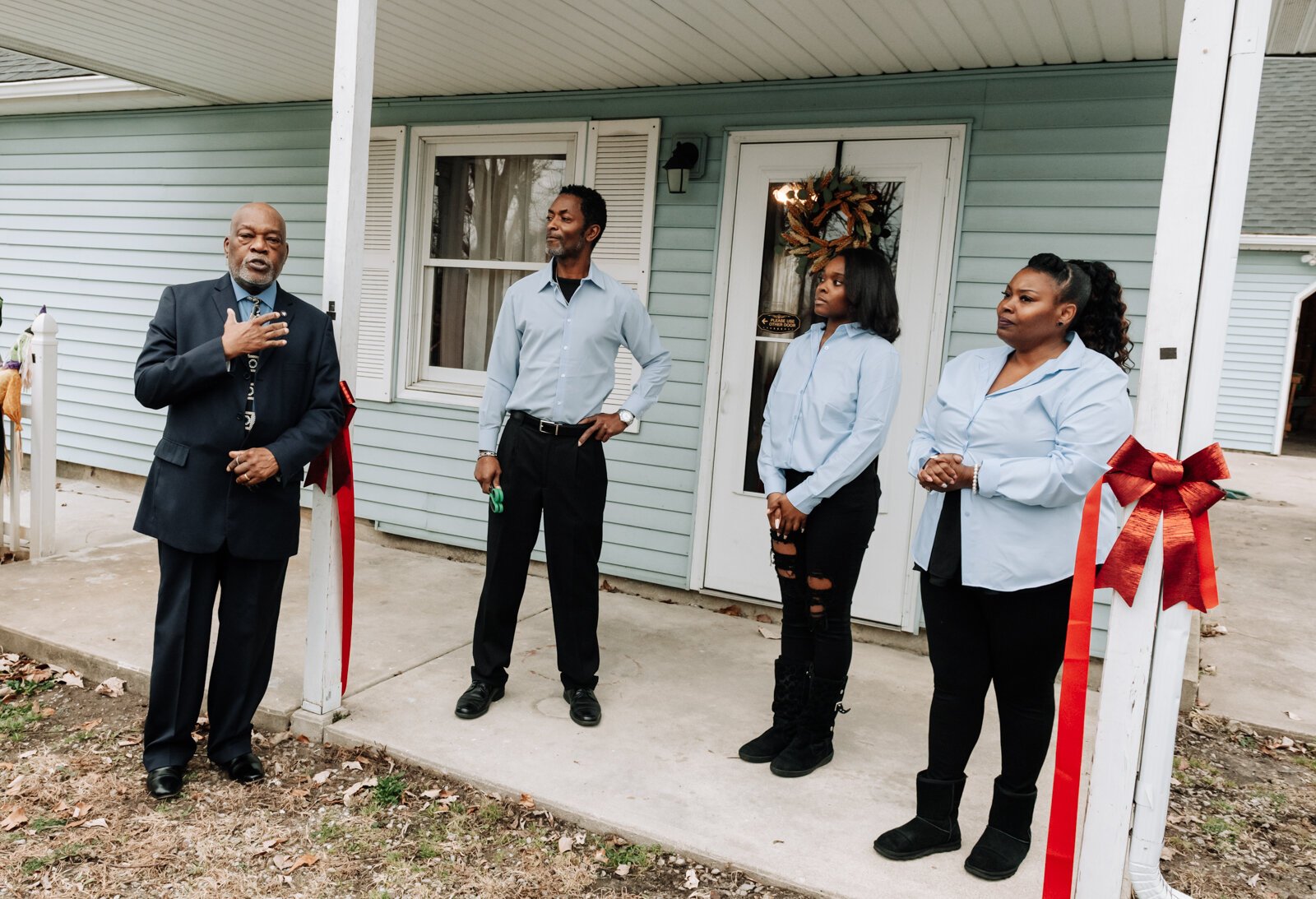 Glynn A. Hines speaks during the ribbon cutting of Hands on Haven Inc.