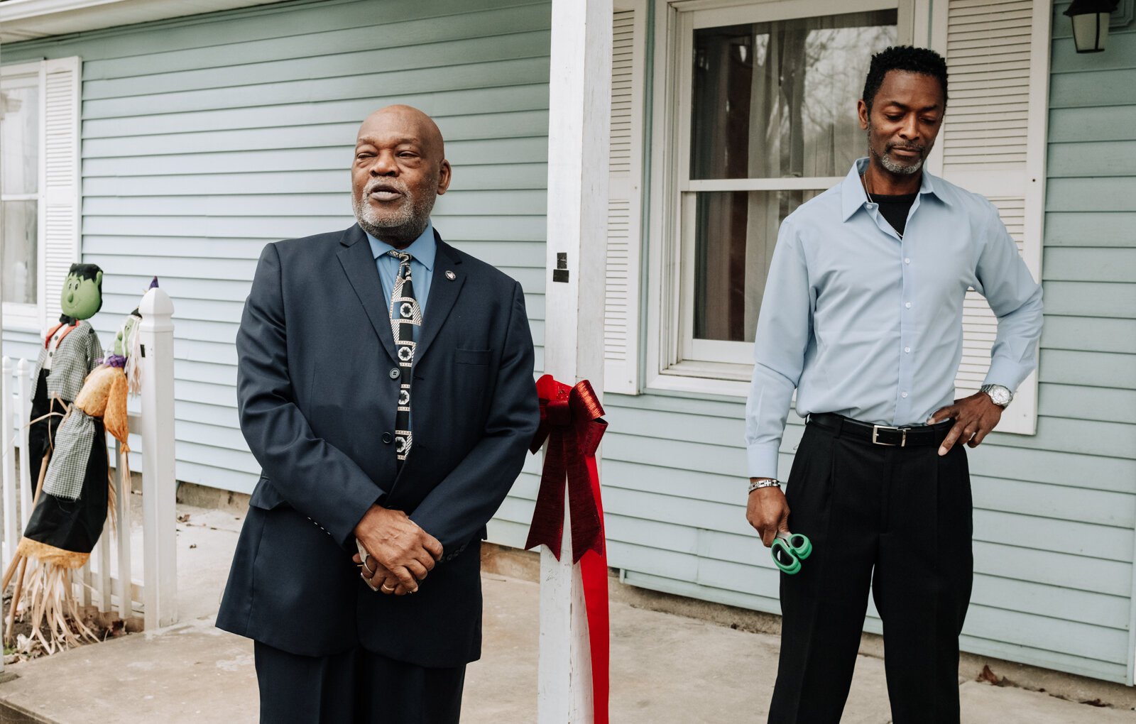 Glynn A. Hines speaks during the ribbon cutting of Hands on Haven Inc.