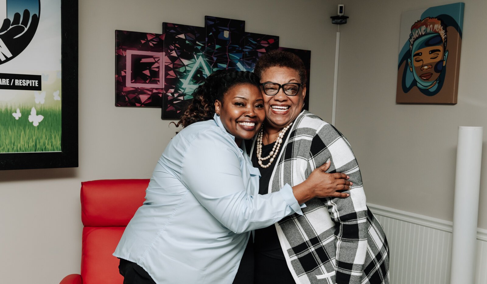 Regenia Jones, left, with Renetta Williams during the open house and ribbon cutting of Hands on Haven Inc.