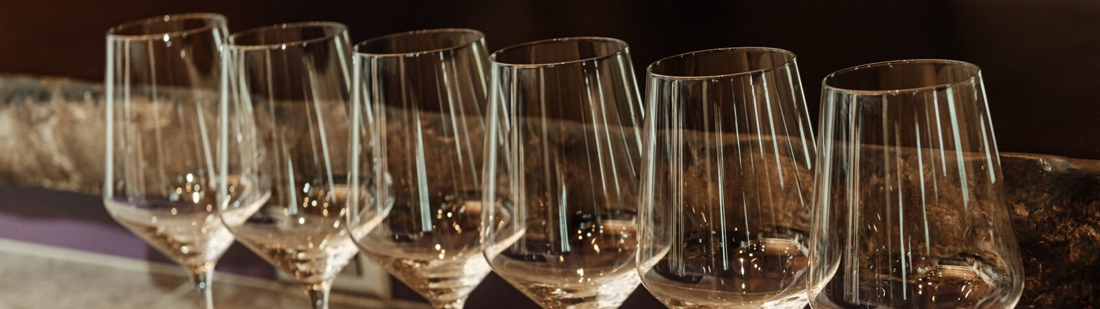 Wine glasses on the counter at Hartland Winery in Ashley, IN.