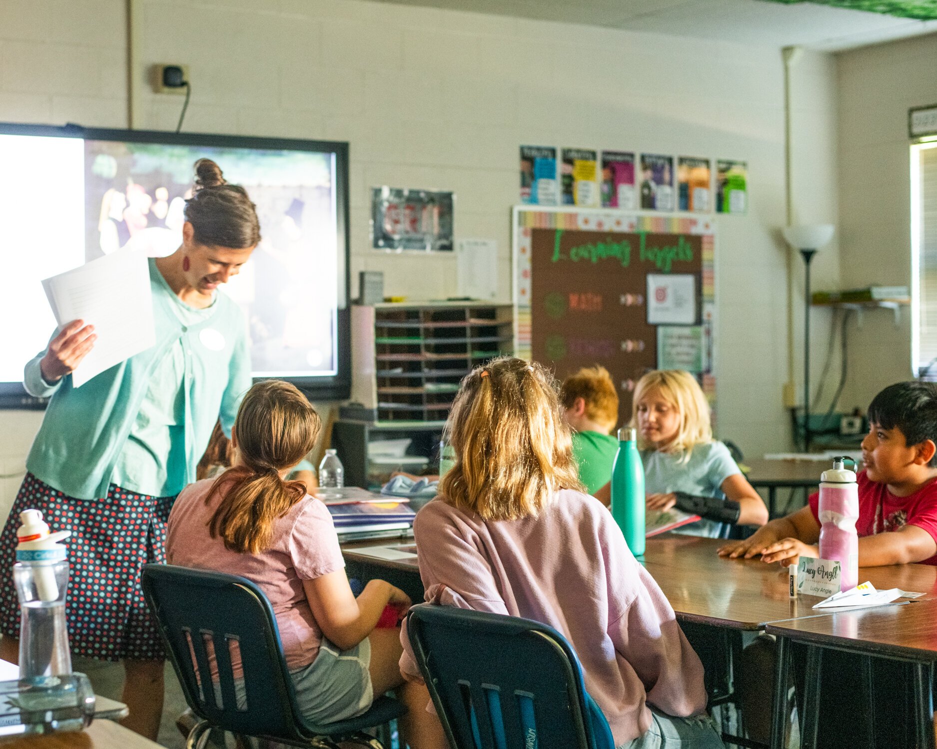 Once a month, students welcome a VTS facilitator in their classrooms and interact with artwork within a familiar space.