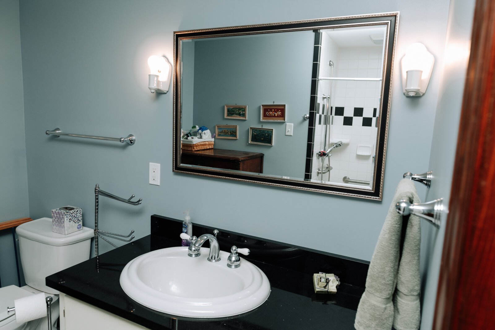 The bathroom in Amy Beatty's accessory dwelling unit that was added on in 2012 to accommodate her mother. The bathroom is equipped with a roll in shower. 