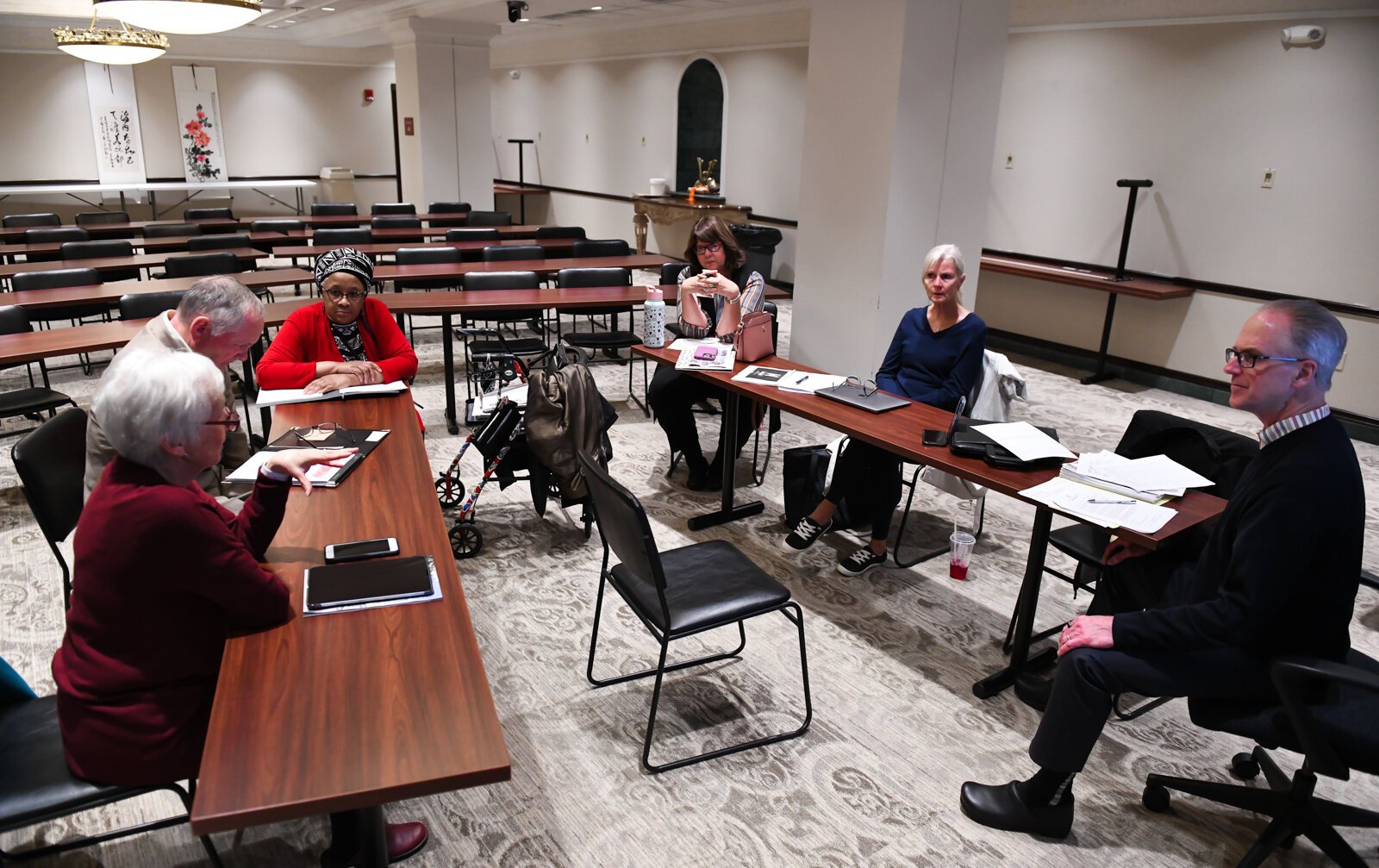 Members of the Mayor's Age-Friendly Council discuss issues during their meeting at Citizen's Square.